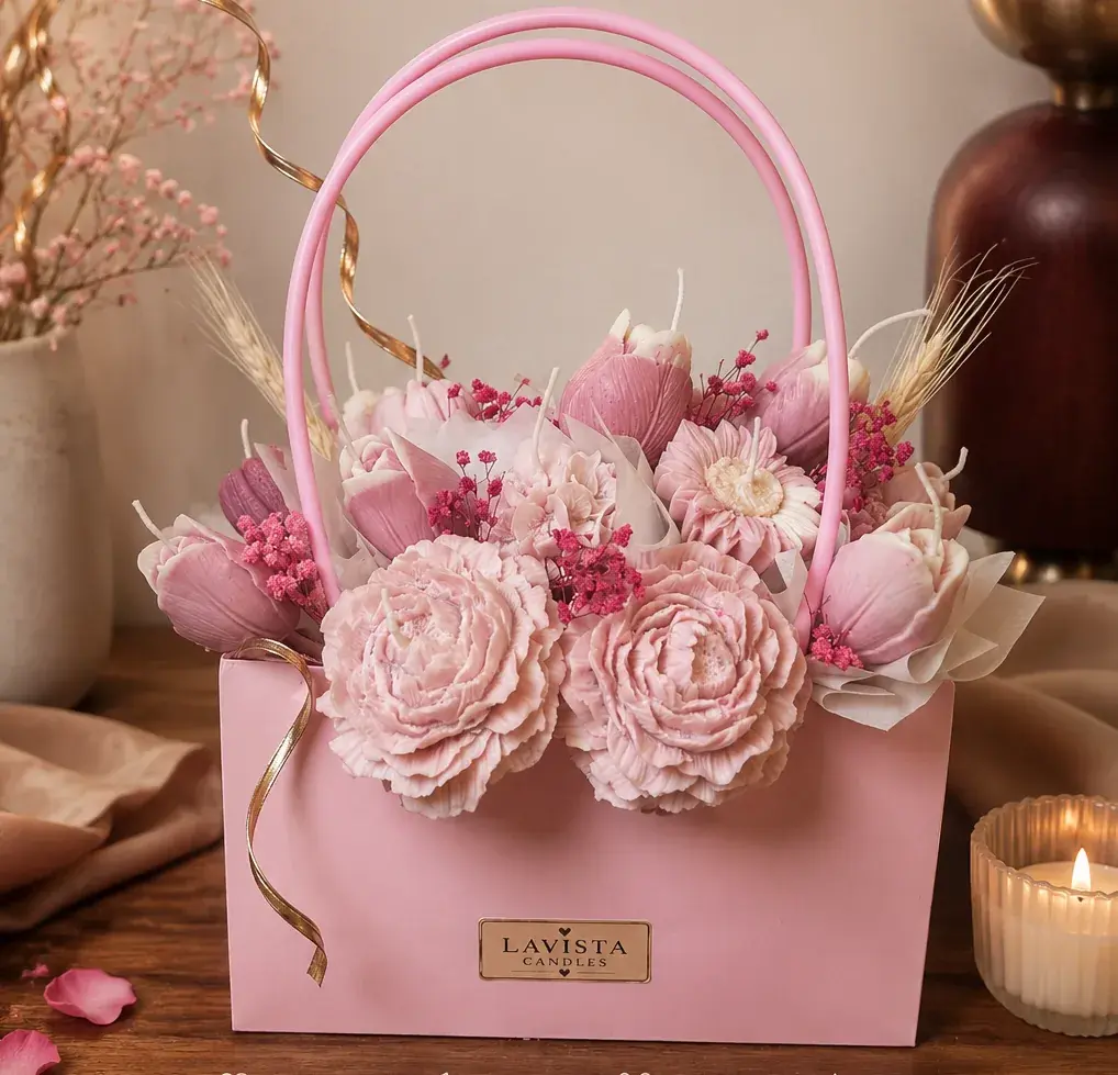 Rose and hydrangea wax bouquet arranged in a miniature purse stand