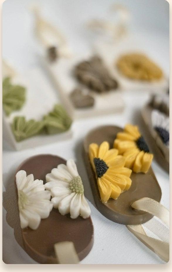 Hand-pressed flower wax sachets on ribbons